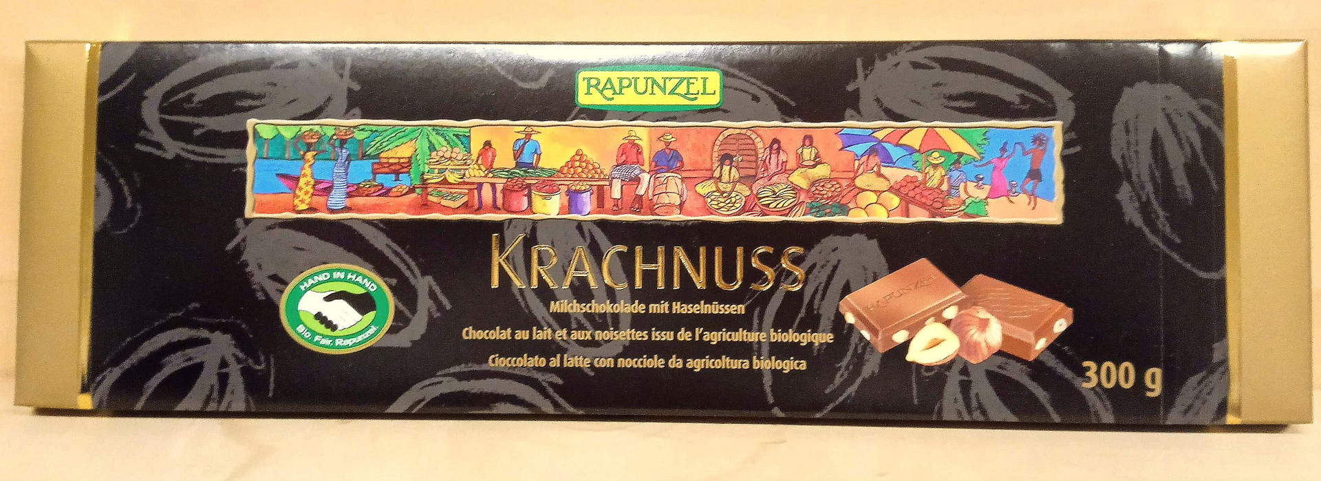 CHOCOLAT AU LAIT ET AUX NOISSETTES ENTIERES